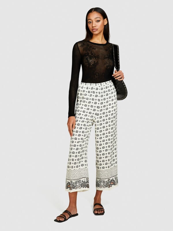 Printed satin trousers - women's flared trousers | Sisley