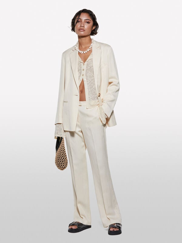 Sand beige trousers with slits - women's palazzo trousers | Sisley