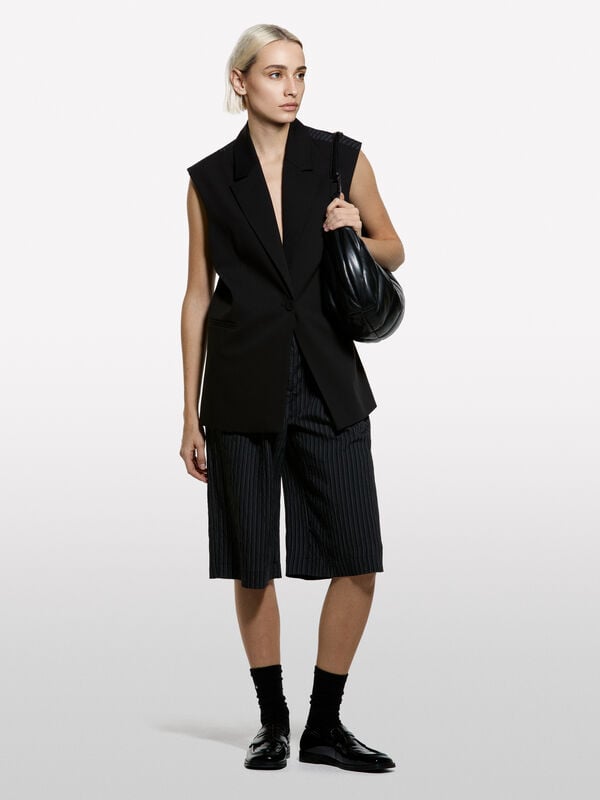 Black vest with clashing stripe - women's vests and sleeveless jackets | Sisley
