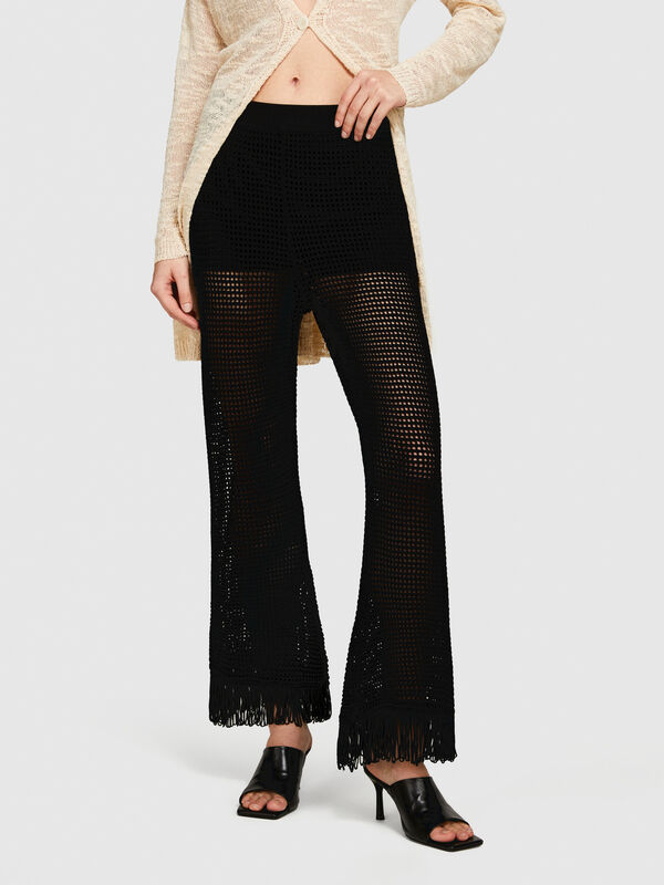 Perforated trousers with fringe - women's flared trousers | Sisley