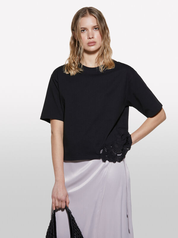 Black t-shirt with uneven embroidery - women's short sleeve t-shirts | Sisley