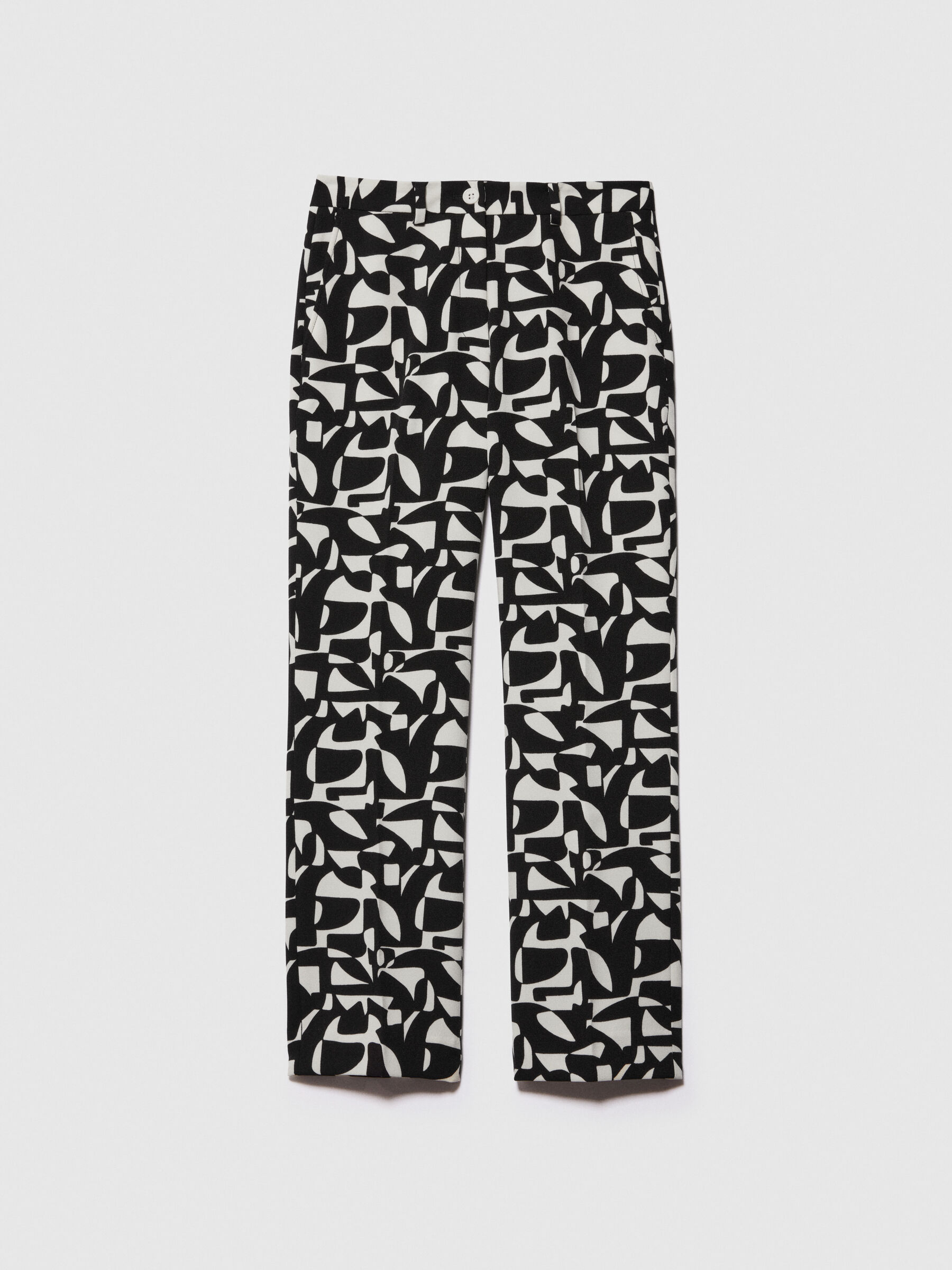 Black and white cigarette trousers top