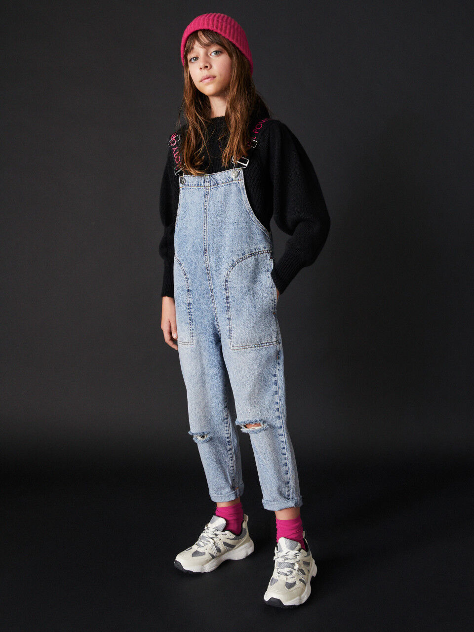 Denim dungarees with tears