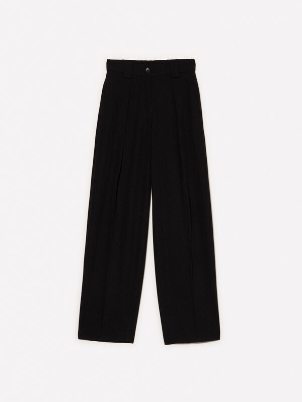 Black palazzo trousers with creases - women's palazzo trousers | Sisley