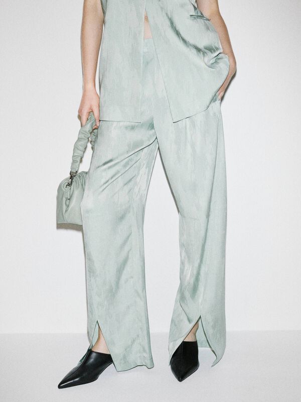 Light green trousers with slits - women's palazzo trousers | Sisley