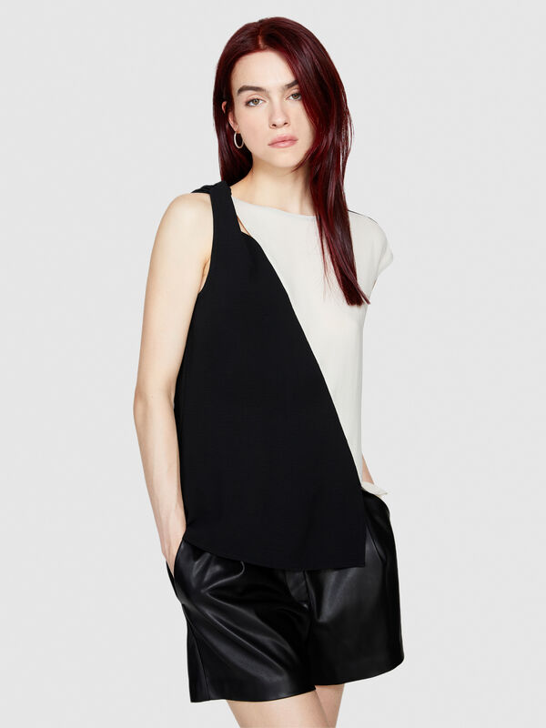 Top with torchon and slit